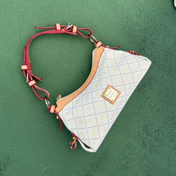 Dooney & Bourke Handbags - Vintage unique Dooney & Bourke Small East/West Slouch or a Hobo style bag.